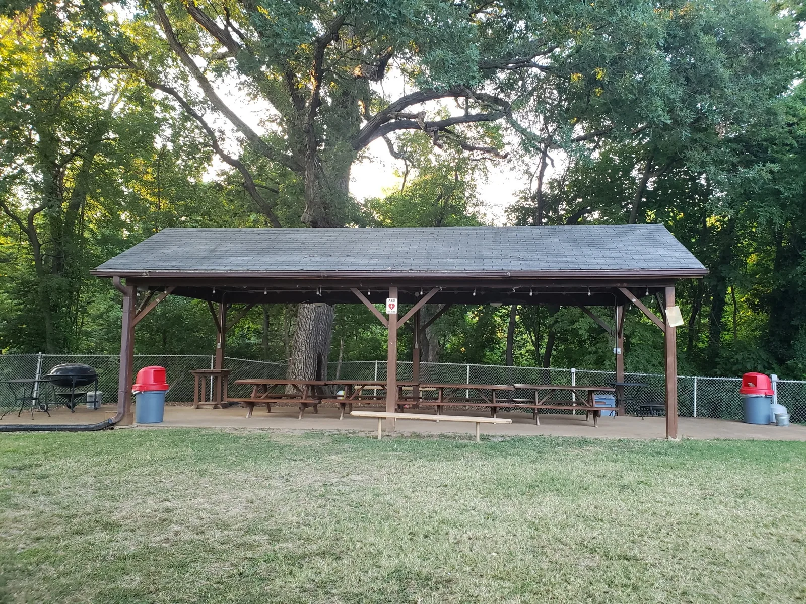 Covered outdoor pavilion with picnic tables at Dorchester