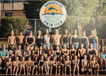 Dorchester Dolphins swim team gathered for a group photograph